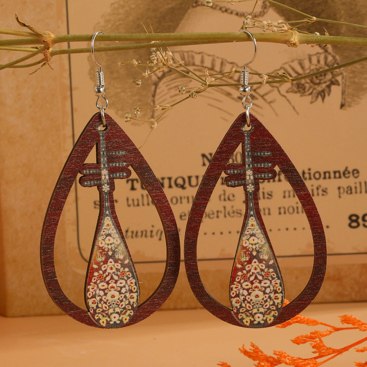 Guitarra de agua de agua al por mayor arpa acordeón estampado de madera aretes de madera